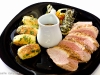 Asian Infused Spiced Pan Fried Duck Breast with Pomme Sarlat, Green Courgettes, Mediterranean Vegetables with a Rich Jus
